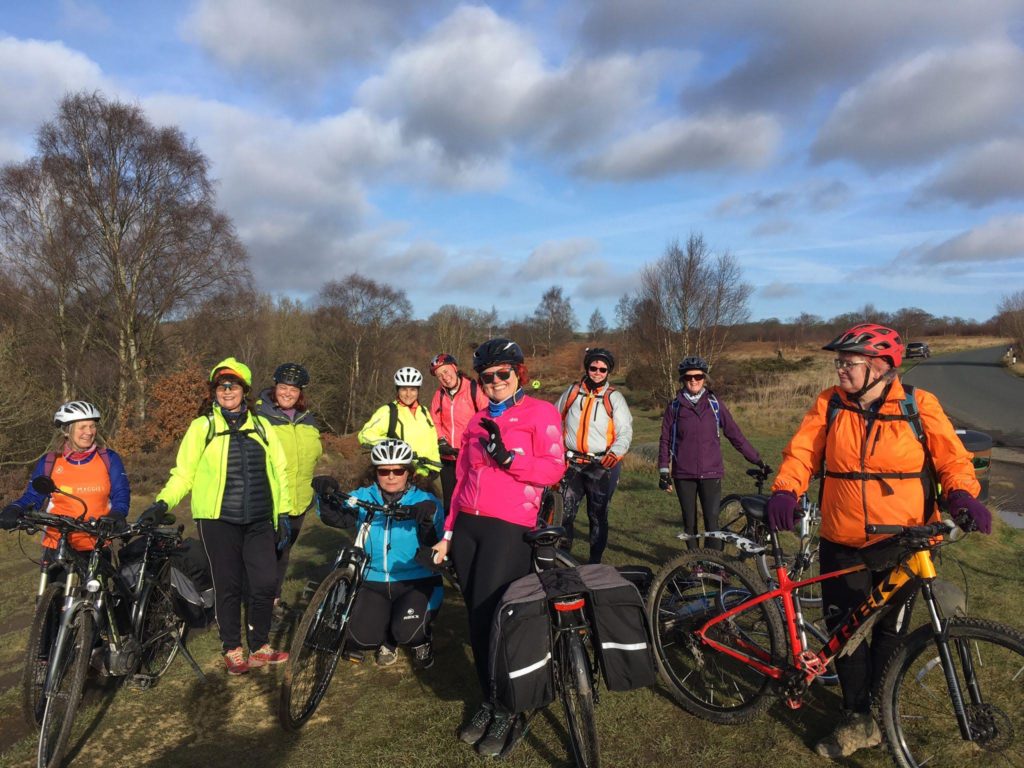 Group of colourful cyclists.