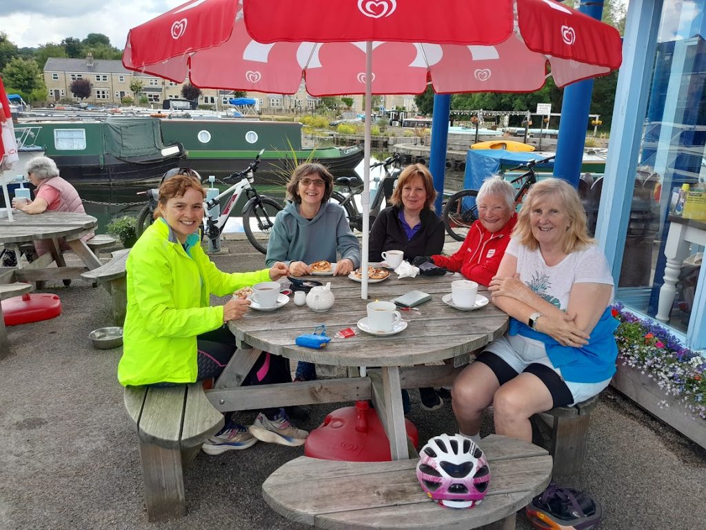 Group of cyclists enjoyed the sun and a cuppa at the marina