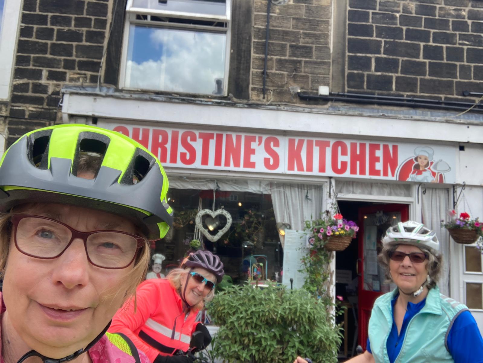 Cyclists outside Christine's Kitchen.