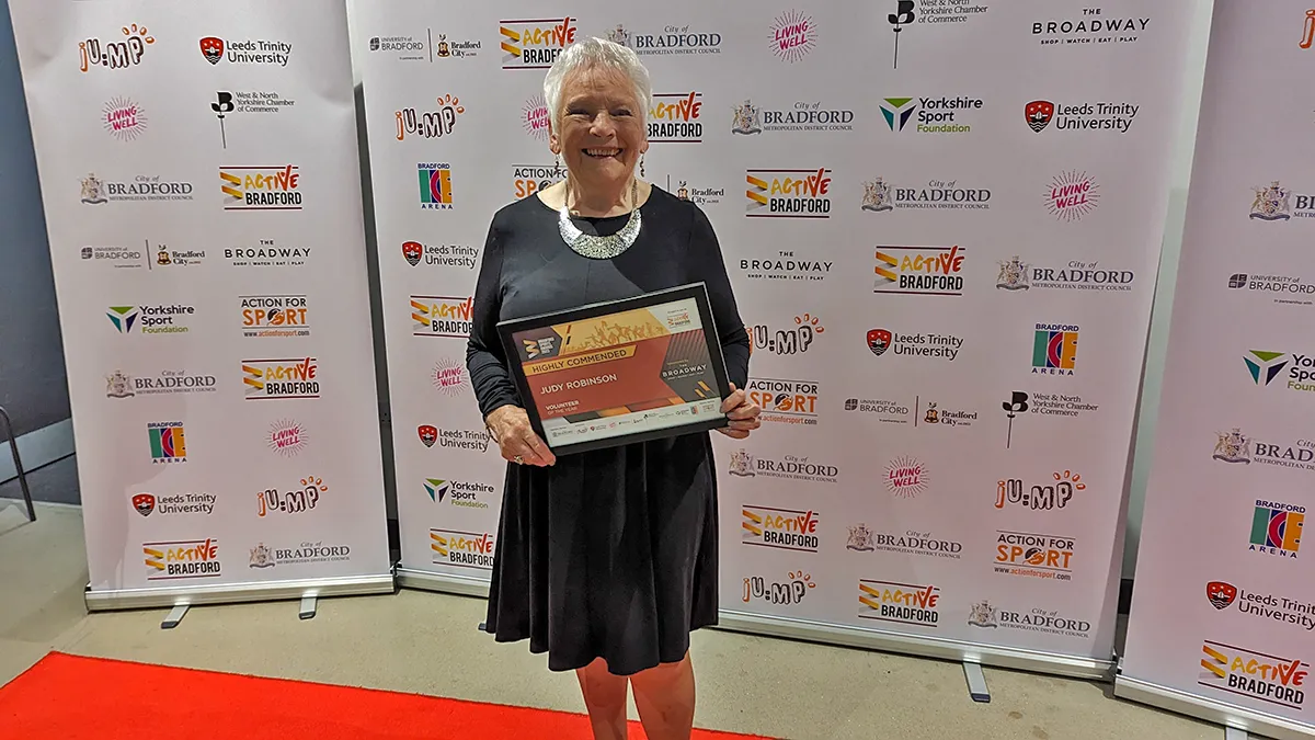 Judy Robinson from Bingley Belles with her award for Volunteer of the Year in 2023.