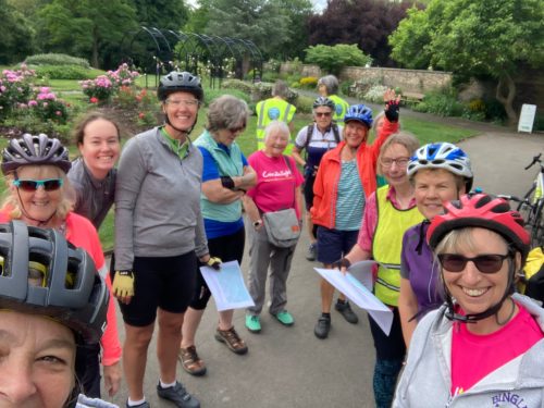 Group of women preparing to go on bike ride